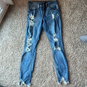 Destroyed denim ankle legging